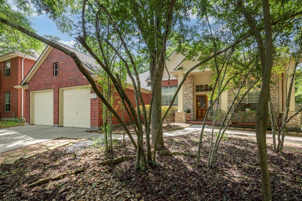 Nestled amongst mature trees providing shade enhances the curb appeal.
