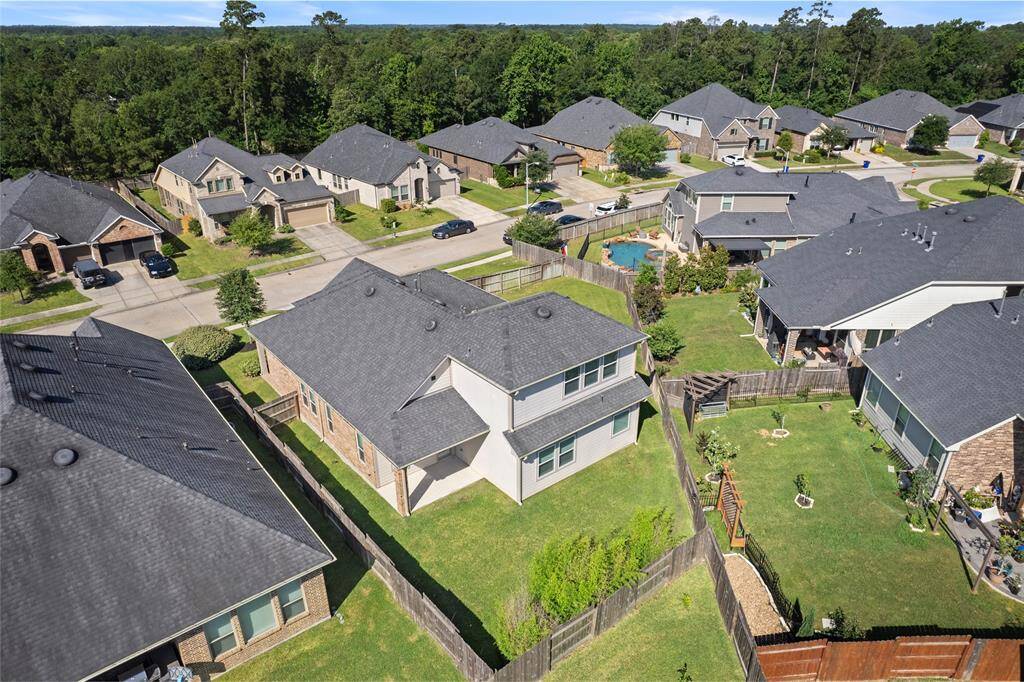 From up here, you can see it all: your pristine lawn, your neighbor’s trampoline, and that one car you swear you’ll move someday.