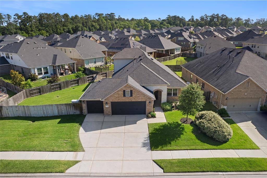 Welcome to the front of the house, where the driveway is long enough for you to have a moment of indecision about which way to park.
