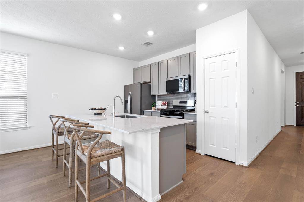 The kitchen island will not disappoint and gives you plenty of space to prepare your meals and spread for family and friends, all while enjoying the open concept living space.