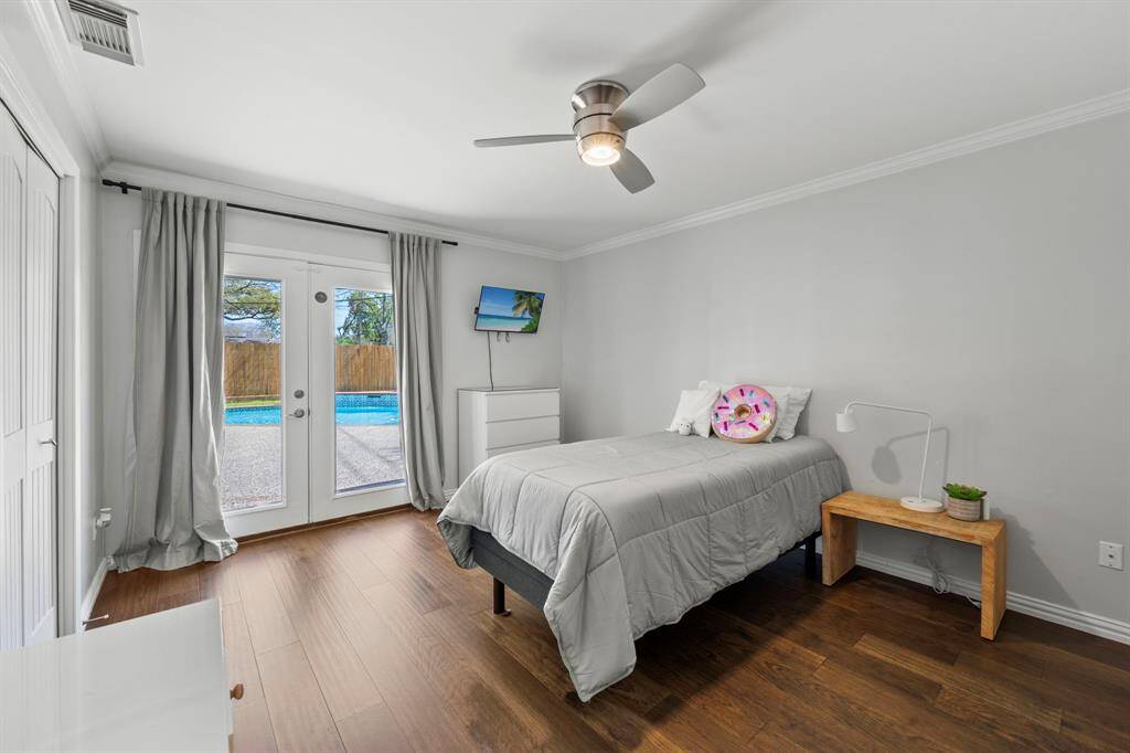 Bedroom number two also features french doors with access to the backyard.