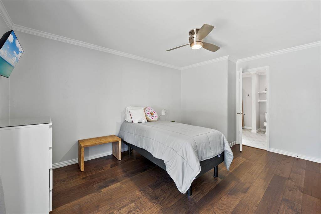 Another view of bedroom number two, and access to bathroom number two.