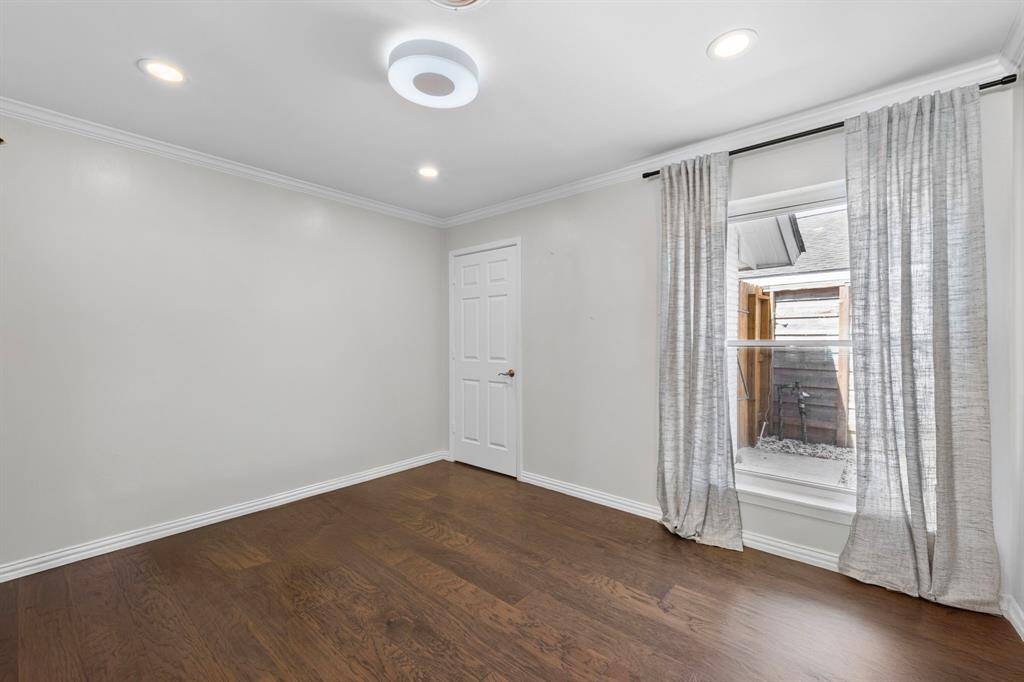 The home office is immediately to the left of the foyer.