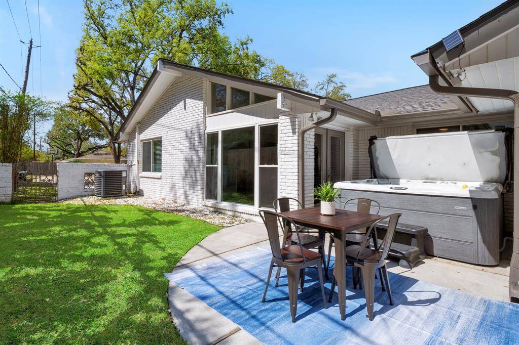 Lovely side patio that is accessed through french doors off of the family room.