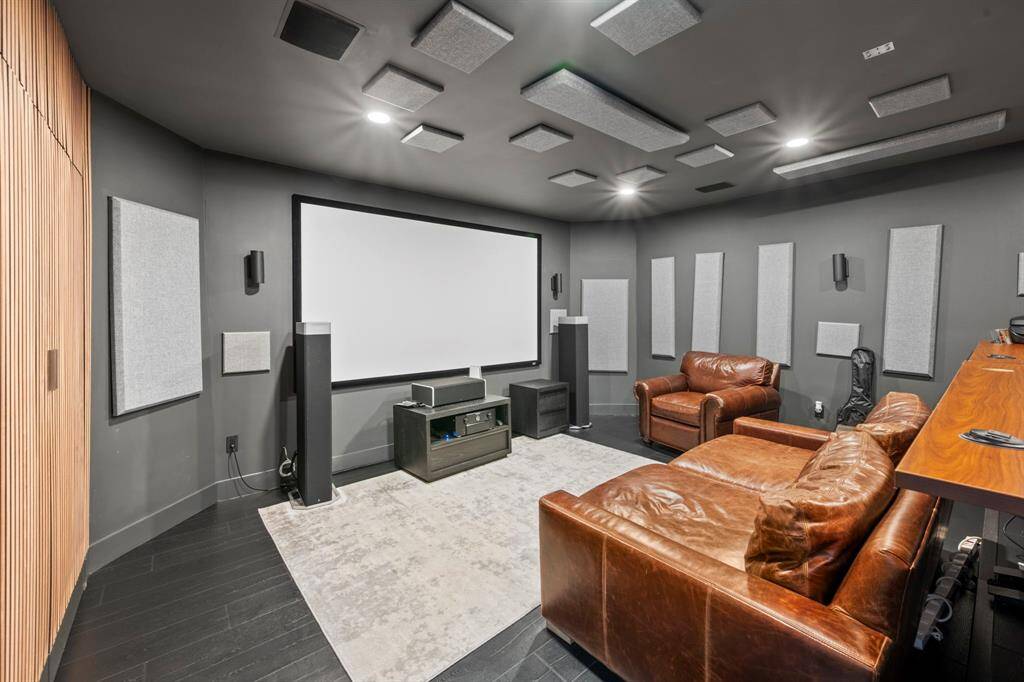 The media room is a recent upgrade. Designed as a high end, sound proof music studio or home theater.