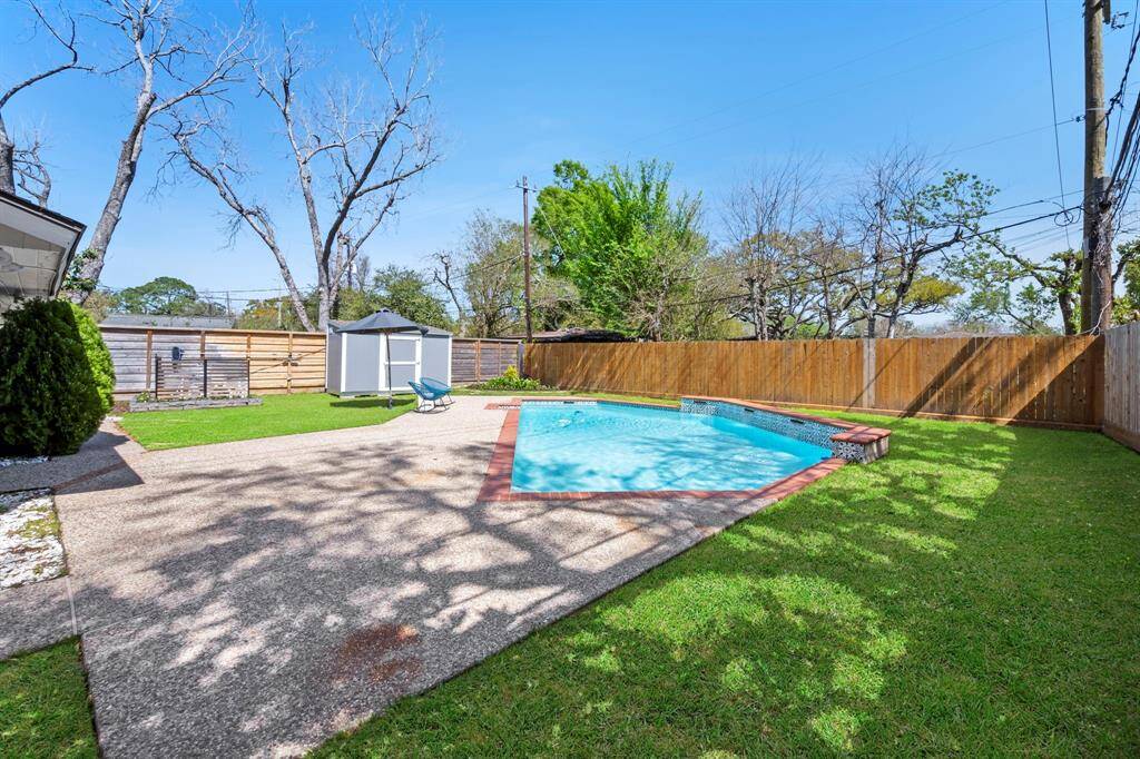 Backyard oasis with sparkling pool is a great place to relax and entertain