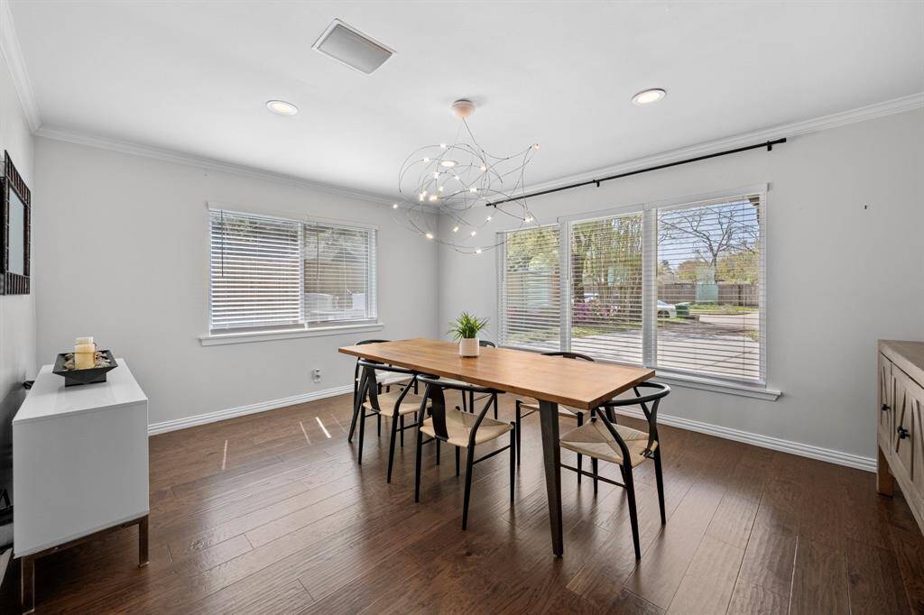 The elegant formal with a full spectrum of energizing natural light courtesy of the large windows.