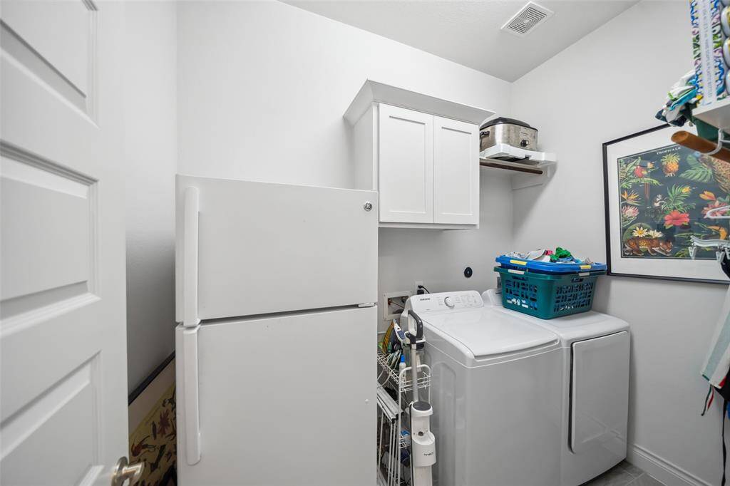 The utility room has a room for a 2nd refrigerator