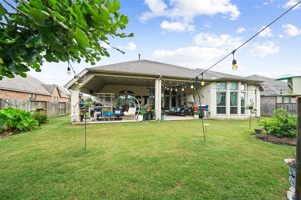 The view of the patio from the backyard
