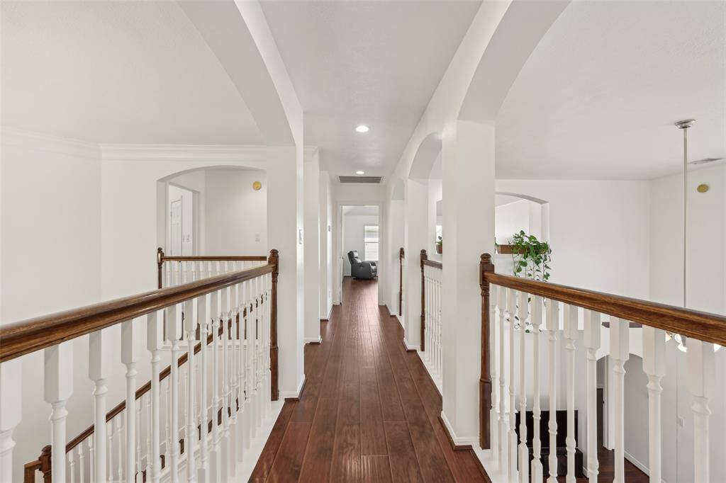 Discover the spacious game room, perfect for entertaining and unwinding. Virtually staged.