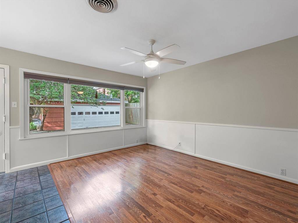 Bright and inviting living room seamlessly connected to the kitchen.