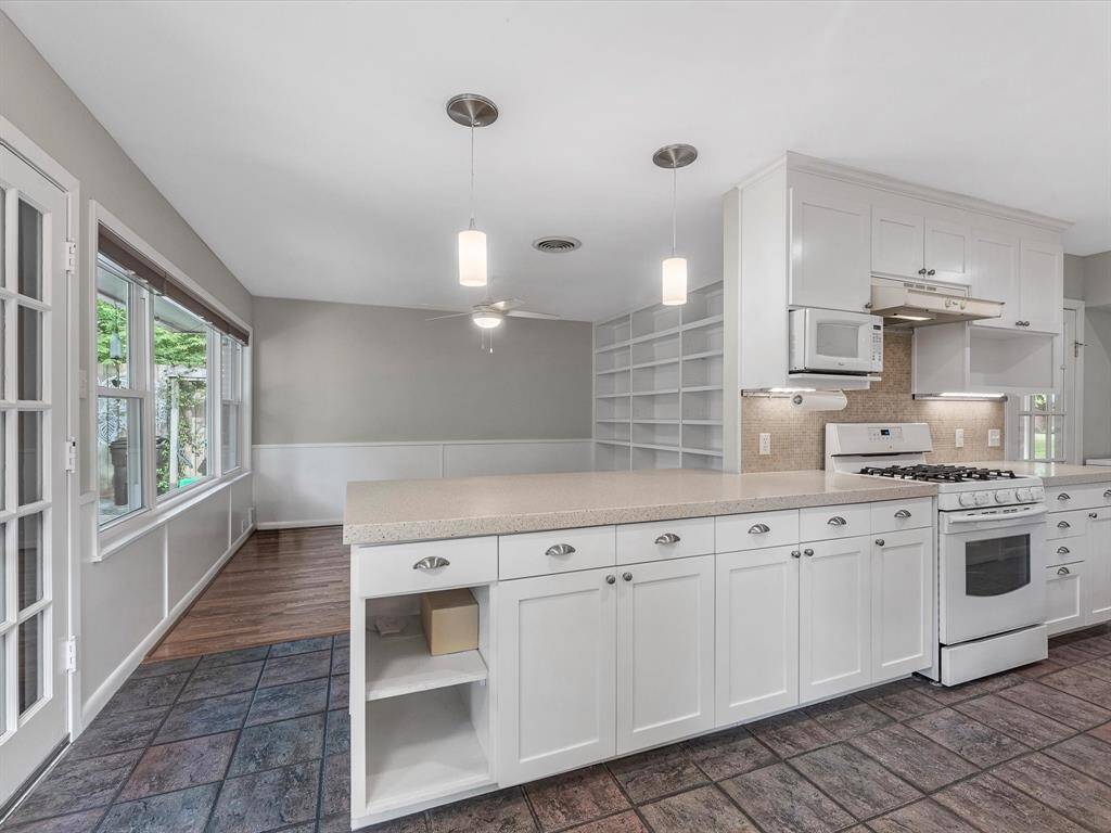 Experience seamless living with the kitchen's open flow into the family room.