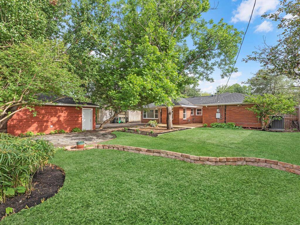Explore this inviting backyard oasis, perfect for relaxation and outdoor gatherings.