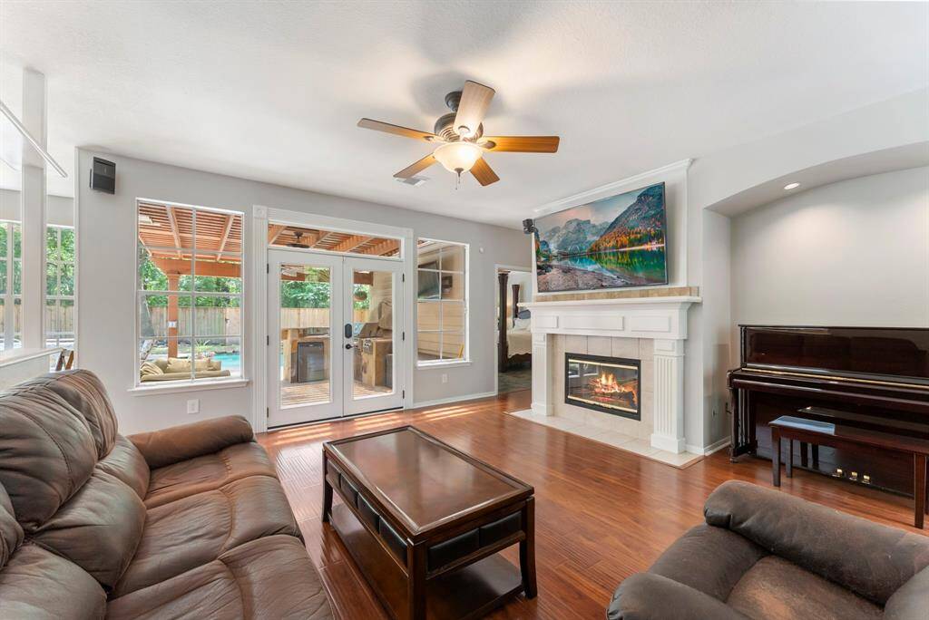 Gather around the fire place in the welcoming family room.