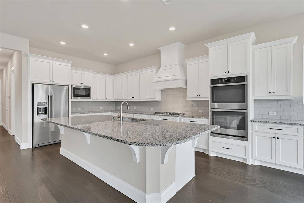 This Kitchen is Glorious for Cooking and Entertaining. Enormous Prep-Areas Ensure Cooking with Multiple Chefs or Entertaining a Crowd Gives Everyone Their Own Space! Double Ovens Make Holidays a Breeze! Bakers Looking for a Home Side-Hustle Can Turn Out Baked Goods Like a Champ!