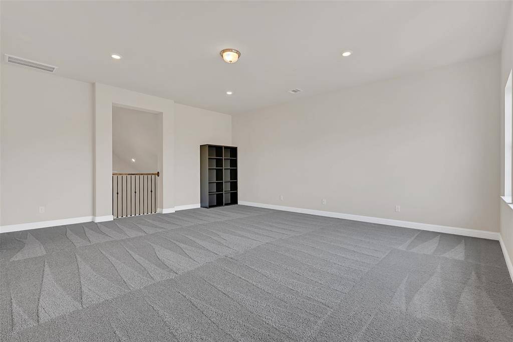 This Upstairs Gameroom/Den Overlooks the Main Living Area. It is the Only Room That is Carpeted - Perfect for Noise Suppression for Loud Games and Movie Night for the "Kids" - Whether They Be Small or Adult-Sized!