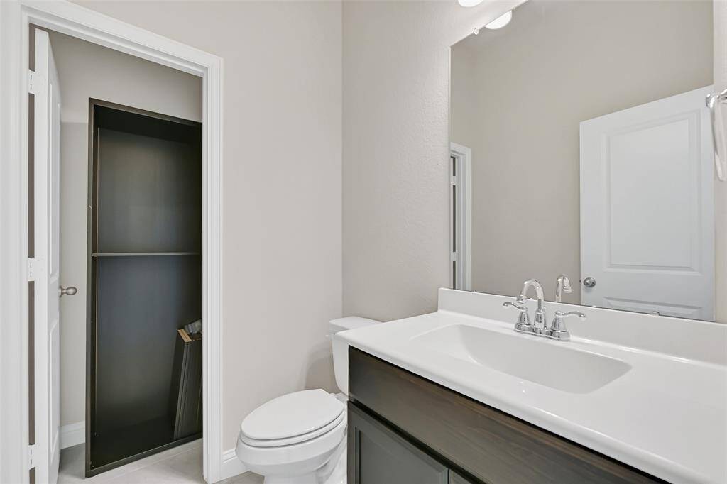 Located on the Second Floor, Just Off of the Gameroom/Den, is This Additional Half Bath (An Upgrade Many Homes with This Floorplan Do Not Have) and a Separate Closet as Shown - No Need to Go Downstairs!