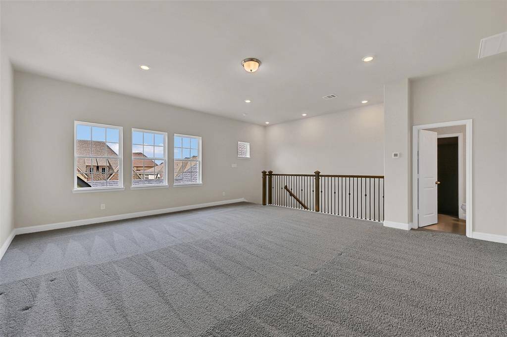 The Gameroom is a Wonderful Bonus Space with Its Own Half Bathroom and an Additional Closet Providing Extra Storage for Family Game Nights on This Level - Perfect for Use as an Additional Bedroom for Family and Friend Sleepovers, Overflow Guests or Holiday Crowds!