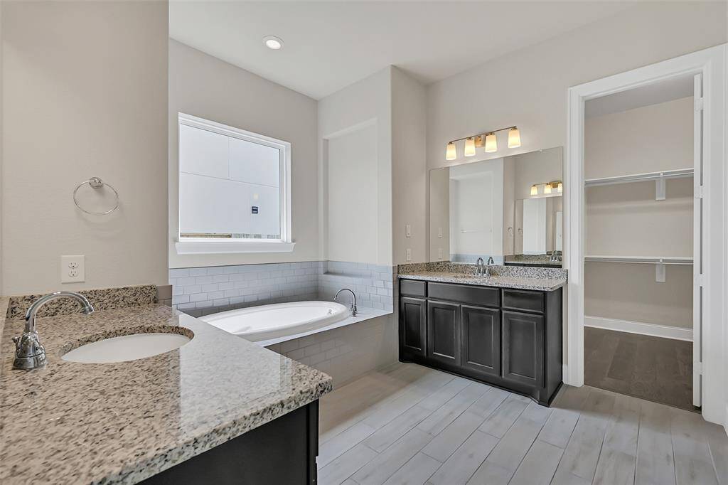 Another Perspective Looking from the Primary Bathroom Door Towards the Closet Area - Just Wait Until You Peak Around the Corner into This Massive Space!
