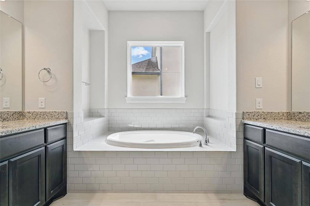 The Garden Tub Area Features Double Art Niches - No Decor Opportunities are Left Behind!