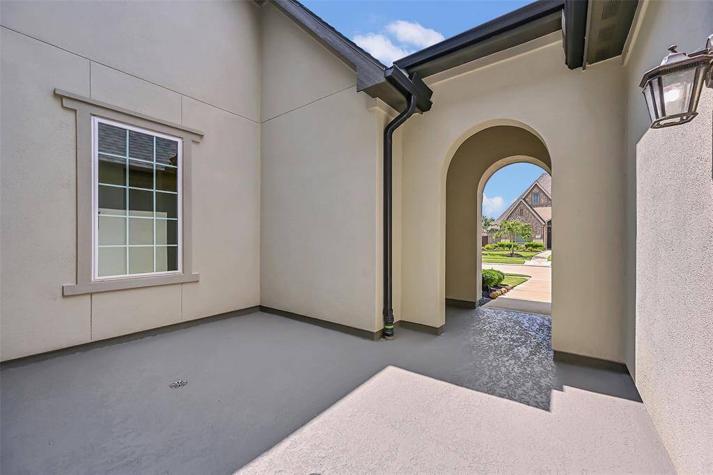 Through the Entry Arch, This Private Interior European-Style Courtyard is a Wonderful Retreat! Another Secluded Space for Afternoon Cocktails, Morning Coffee or a Little Family Separation When Needed!