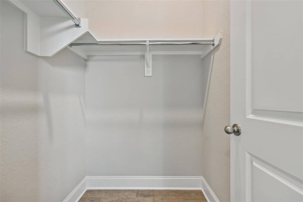 All of the Secondary Bedroom Walk-In Closets are Spacious and Similar to This One!