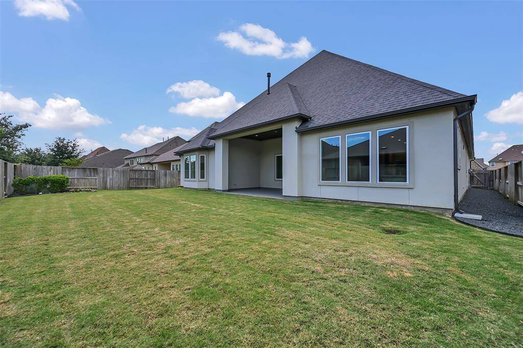 Perfectly Sized Backyard! Instead of Yard Duty, Spend Your Free Hours Playing with All of Meridiana's Extensive Amenities! Here There is Just Enough Outdoor Space Without a Ton of Maintenance!