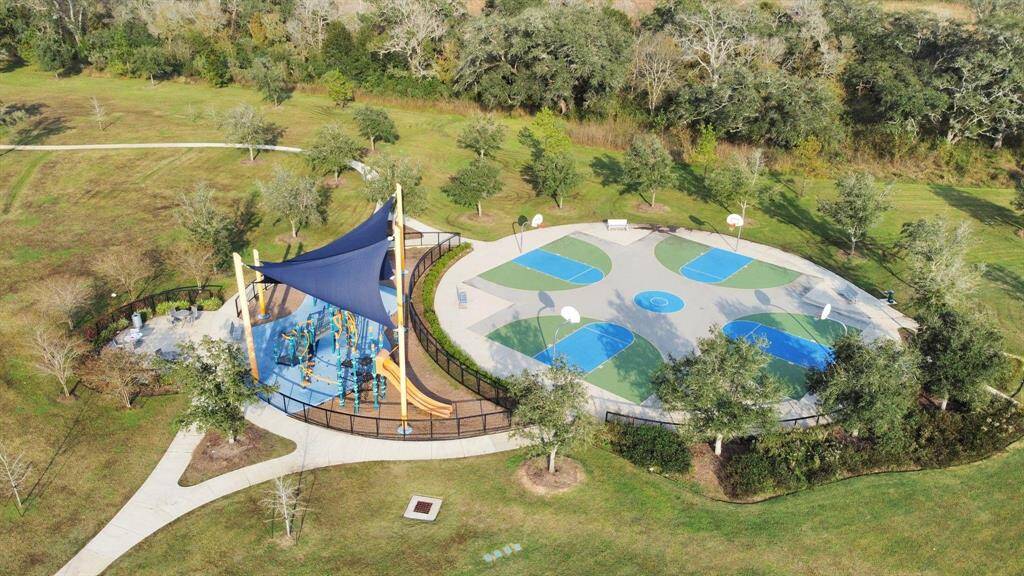 Creative Exercise Spaces - as in this Basketball Practice Court with Nearby Children's Play Area! Walking and Jogging Trails and Multiple Pools - Oh My! Life is Fun at Meridiana!