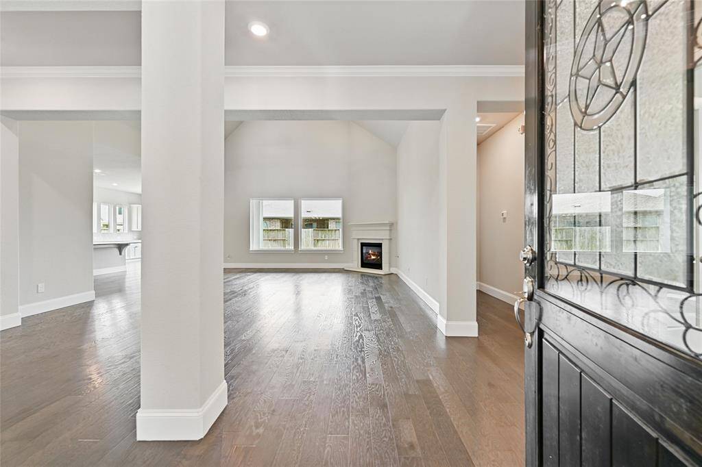 Walking Into This Amazing Home - the Cathedral Ceiling Greets You and the Low Maintenace Engineered Wood Floors Throughout the Home Looks Fabulous Every Day!