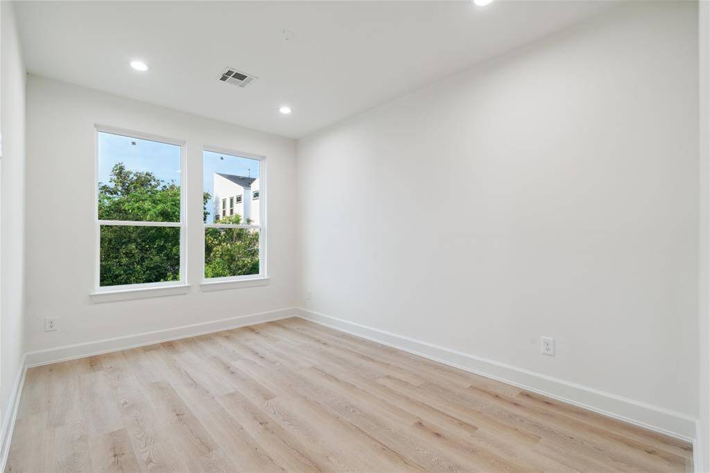 Enjoy comfort in the secondary bedrooms, complete with oversized windows and walk-in closets. These thoughtfully designed spaces offer abundant natural light and storage, making them perfect retreats for relaxation and personalization.