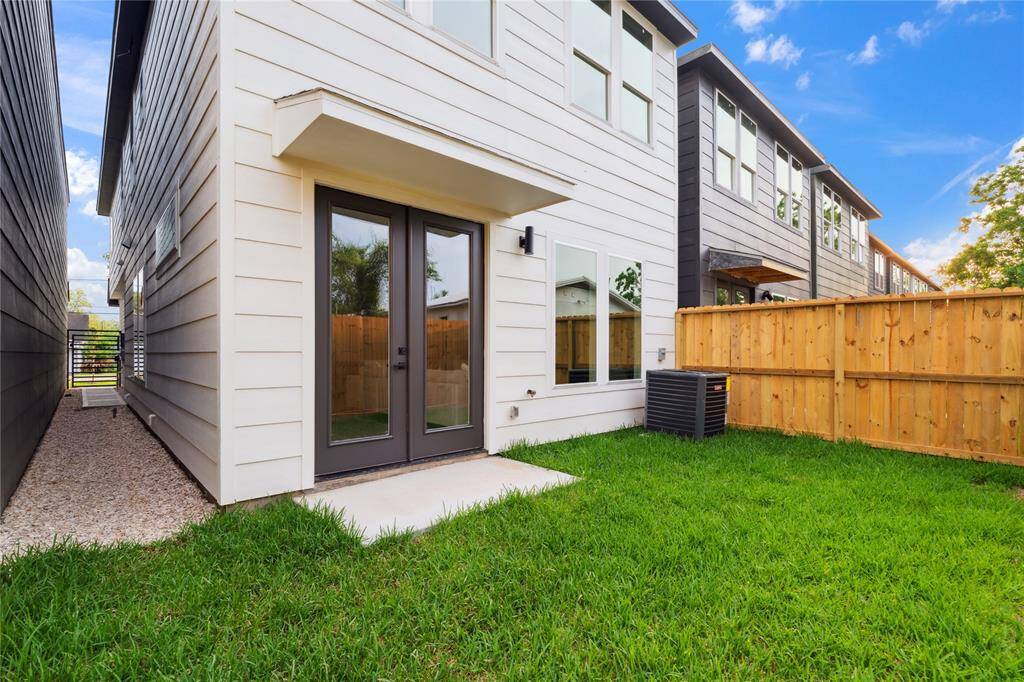 Enjoy a private backyard retreat, ideal for relaxation and outdoor gatherings. This tranquil space offers privacy and a serene atmosphere, perfect for enjoying the outdoors in peace.