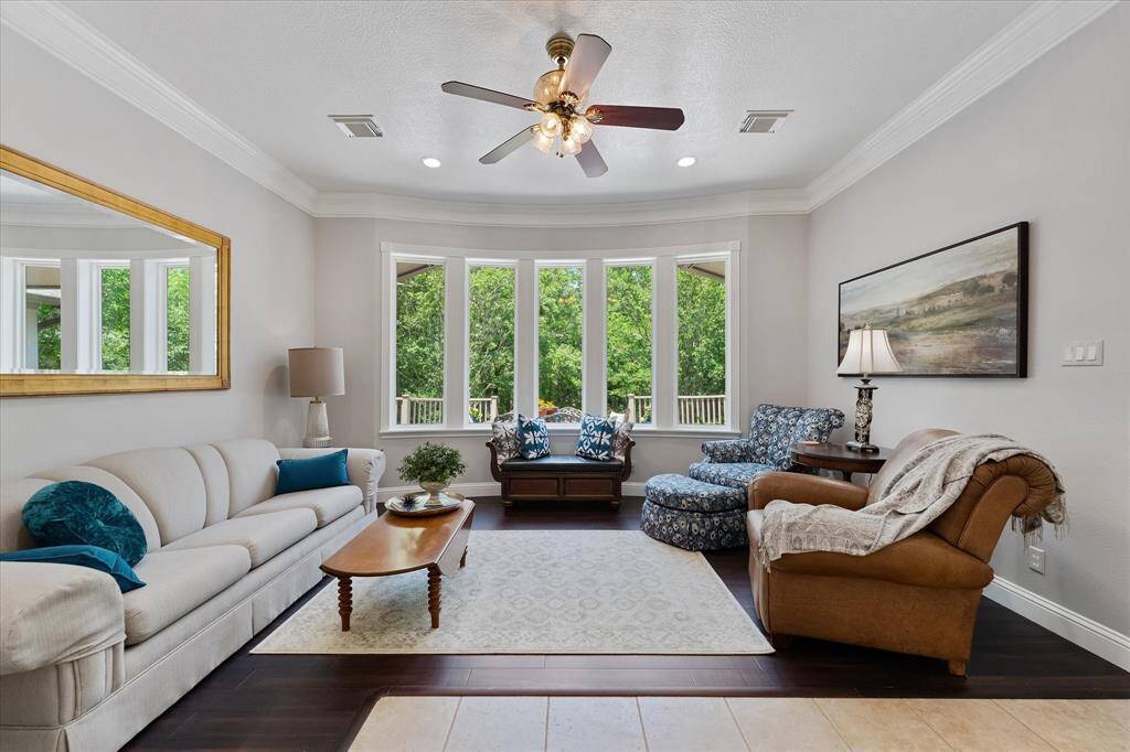 Living room/ Music room/ reading area with gorgeous view of backyard and deck