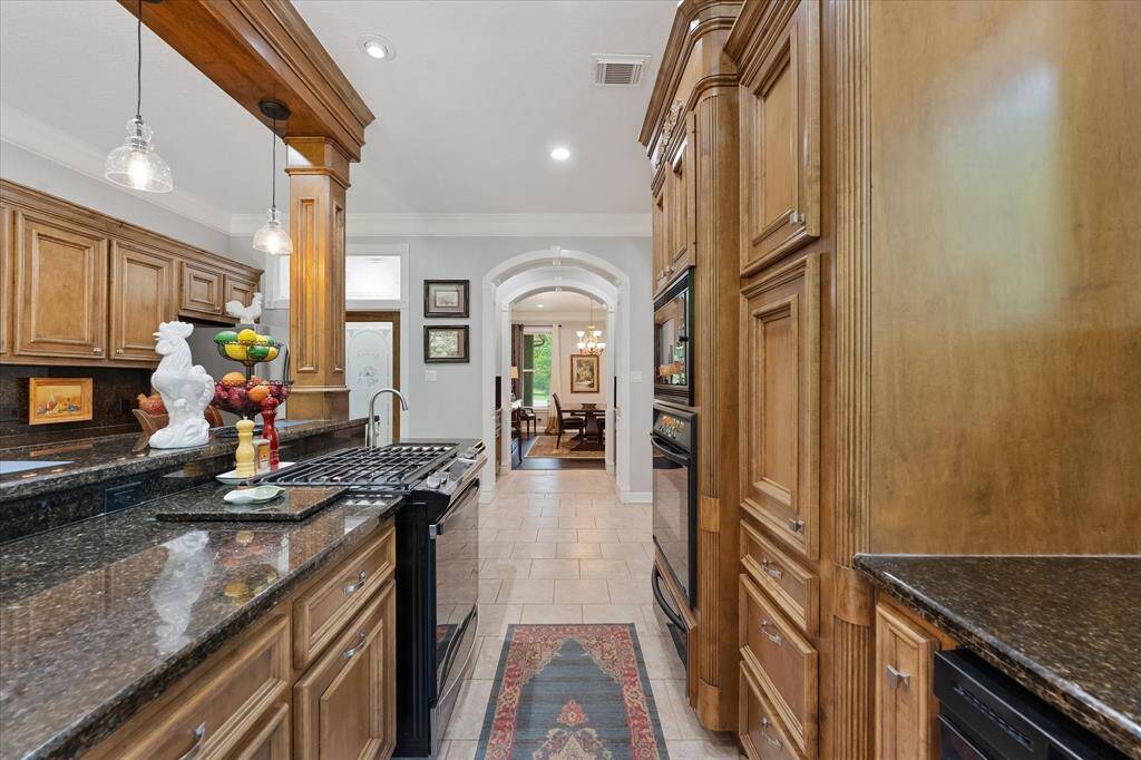 View looking back into dining room and pass through butlers pantry