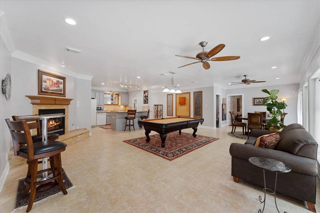 In the walkout basement you have fireplace, large storage room, large secondary bathroom , office plus 3 secondary bedrooms  or very versatile and you could have a second large office down also.  All bedrooms have HUGE walk in closets!