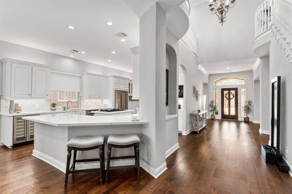 This home's design features are perfect with handsome archways, niches and a fabulous open floor plan.