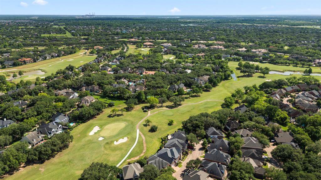 The Pecan Course of Sweetwater Country Club is a beautiful 18-hole course that runs behind this home.