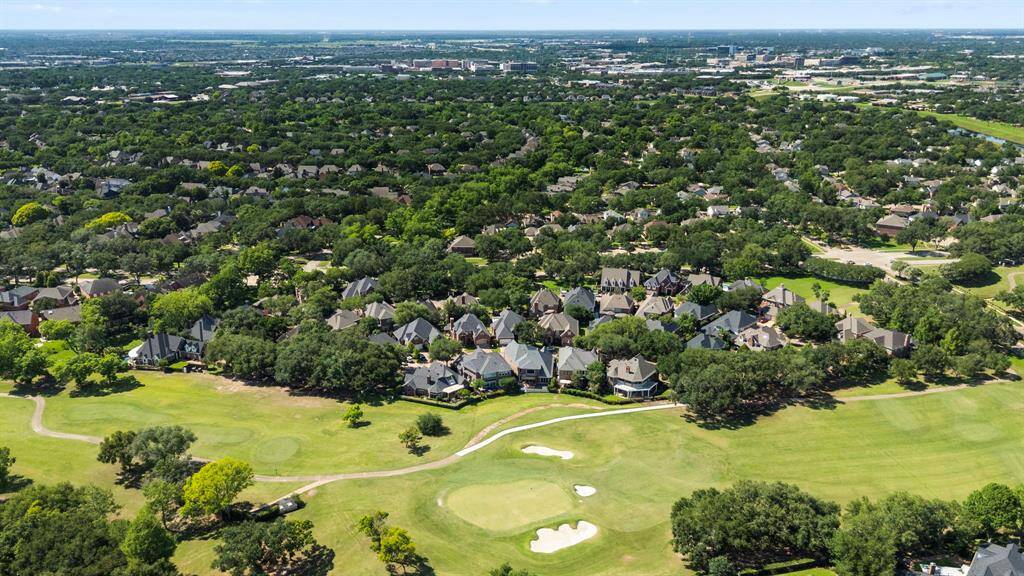 Another view of the golf course with Sweetwater and Sugar Land in the background. Not only does this home boast a fabulous golf course location, but its gated community is located in the heart of Sugar Land with Town Center only 2 miles away. Welcome home!