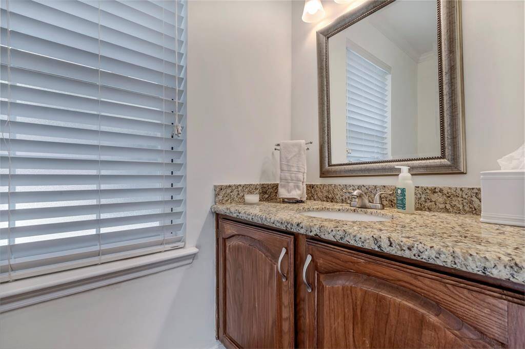 Half bathroom off of kitchen