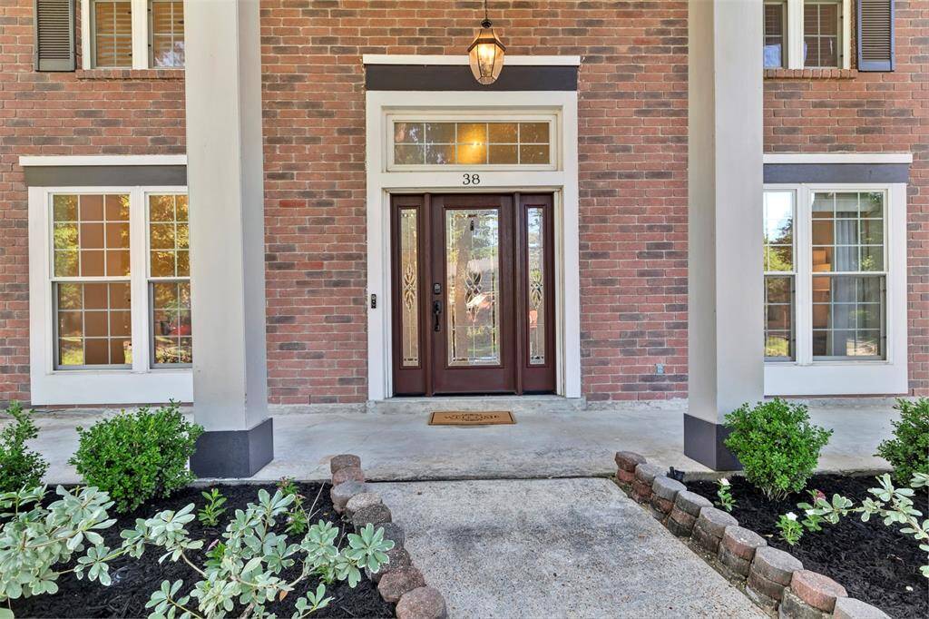 Beautiful front entry with porch large enough for rockers