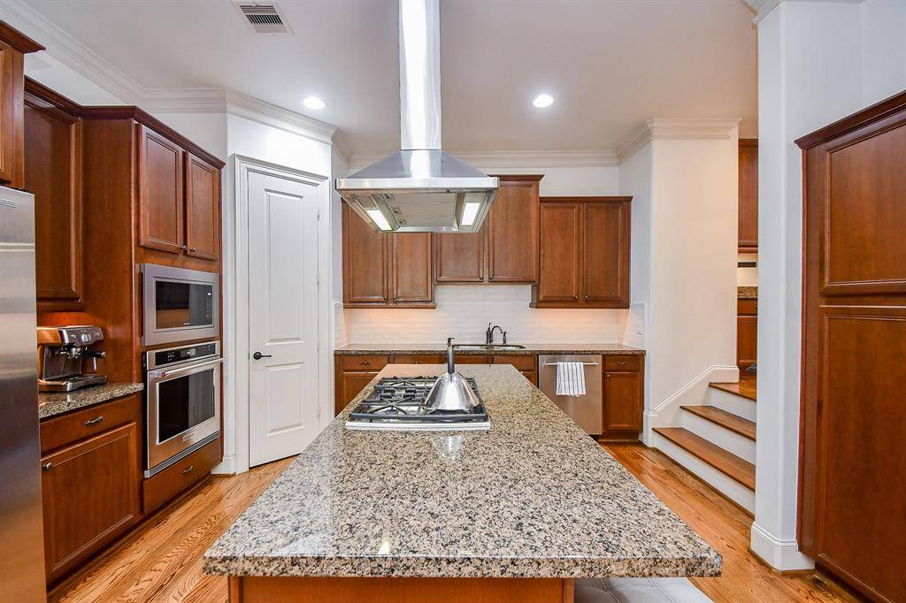 Lots of storage and lovely cabinetry.