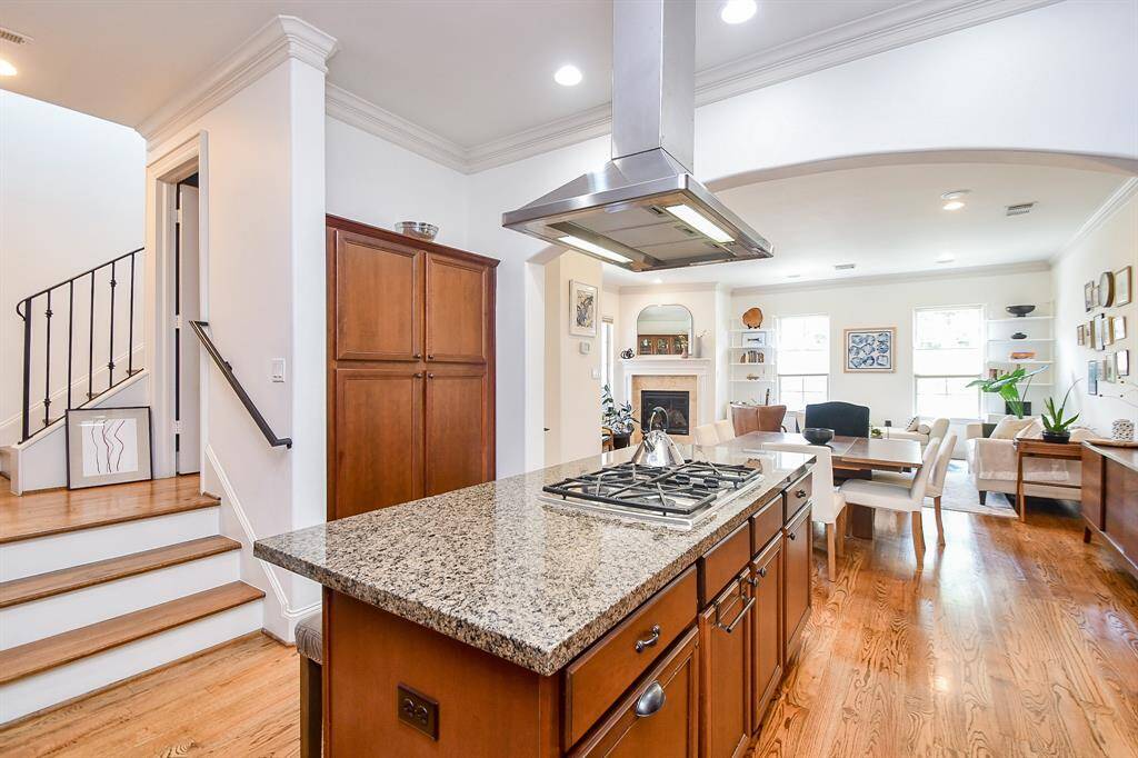 View from kitchen into open living and dining area.