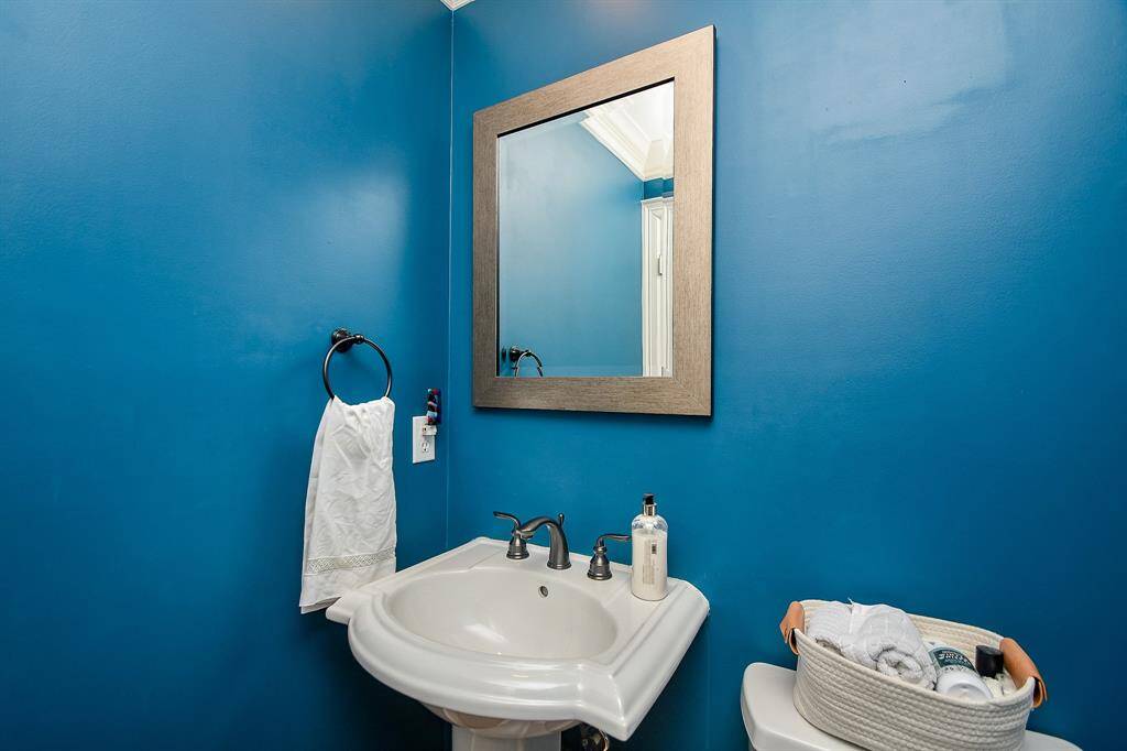 Half bath off of the landing going to the 3rd floor.