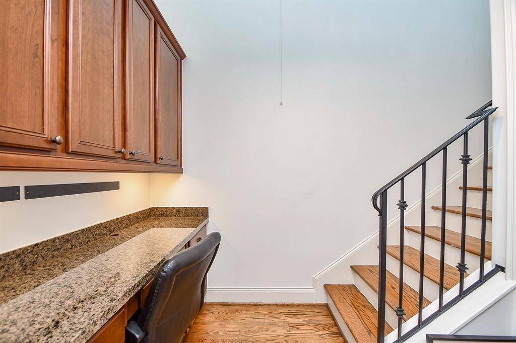 Built in desk area for a possible home office.