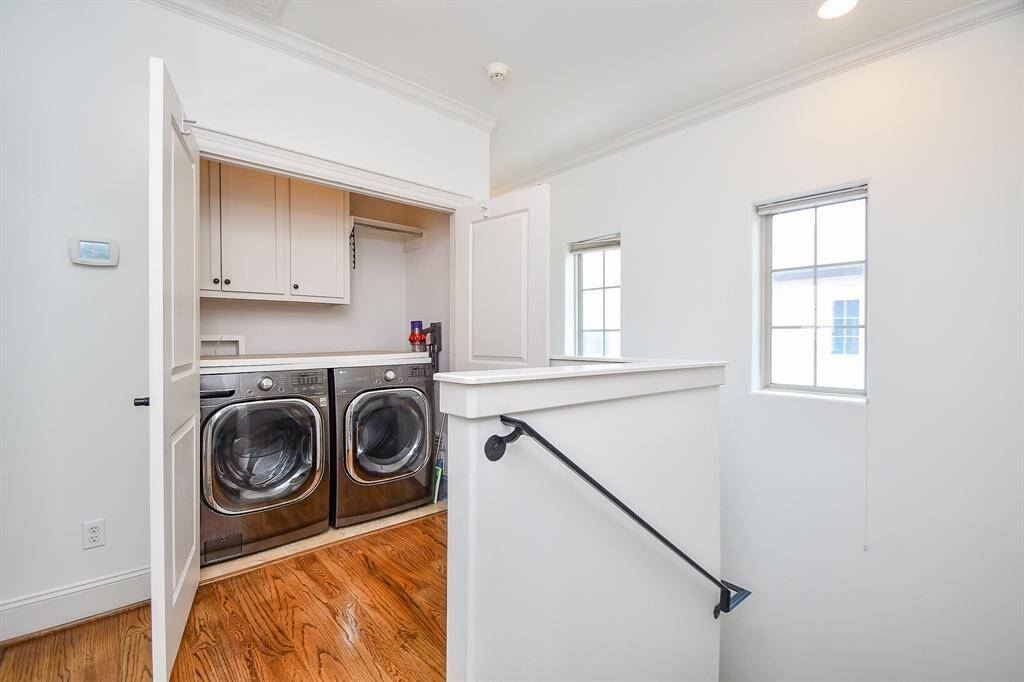 Washer and dryer on the third floor stay with the home.