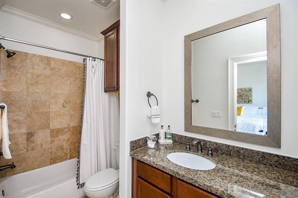 Full bathroom off of the secondary bedroom on 3rd floor.