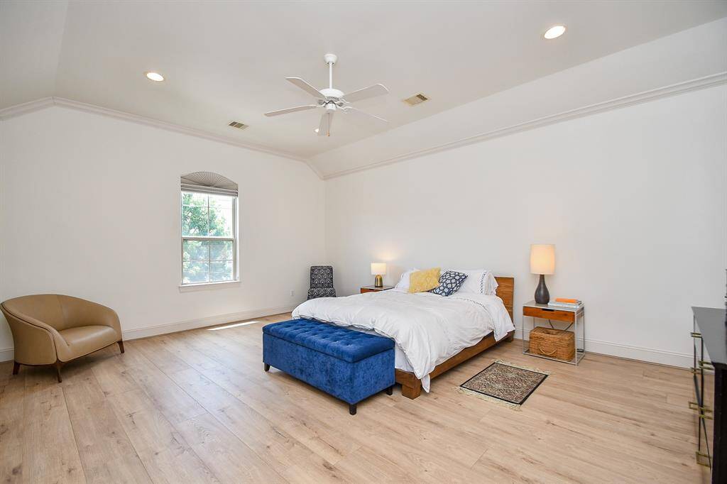 Huge primary bedroom on 3rd floor with full bath.
