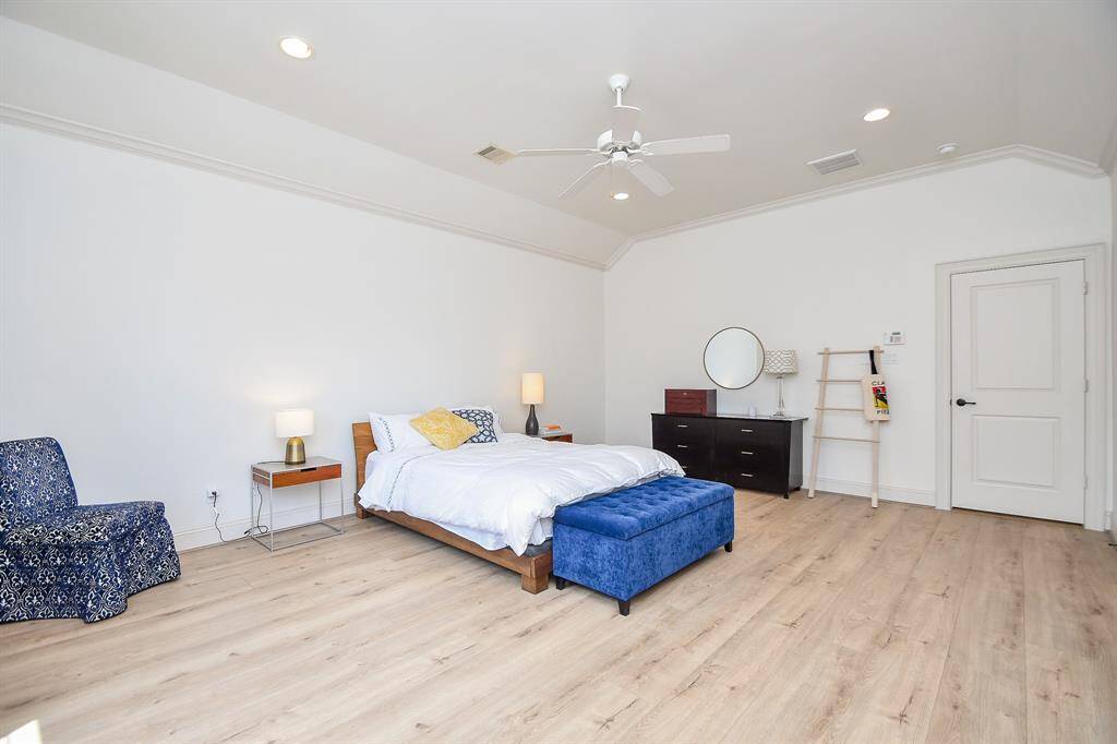Another view of the primary bedroom.