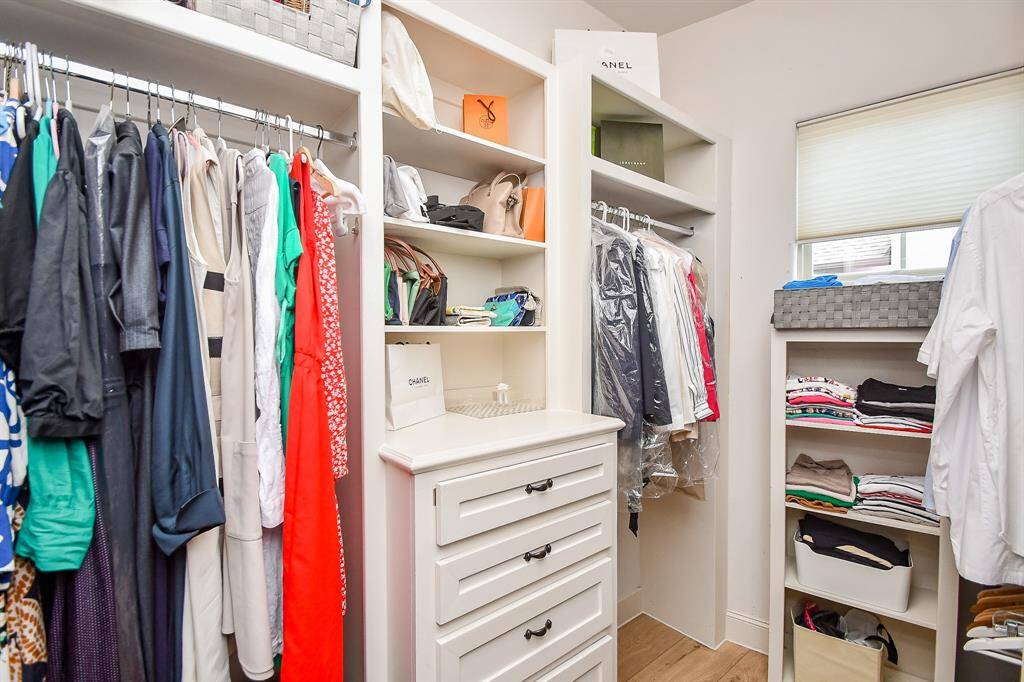 Custom walk in closet in the primary bedroom.