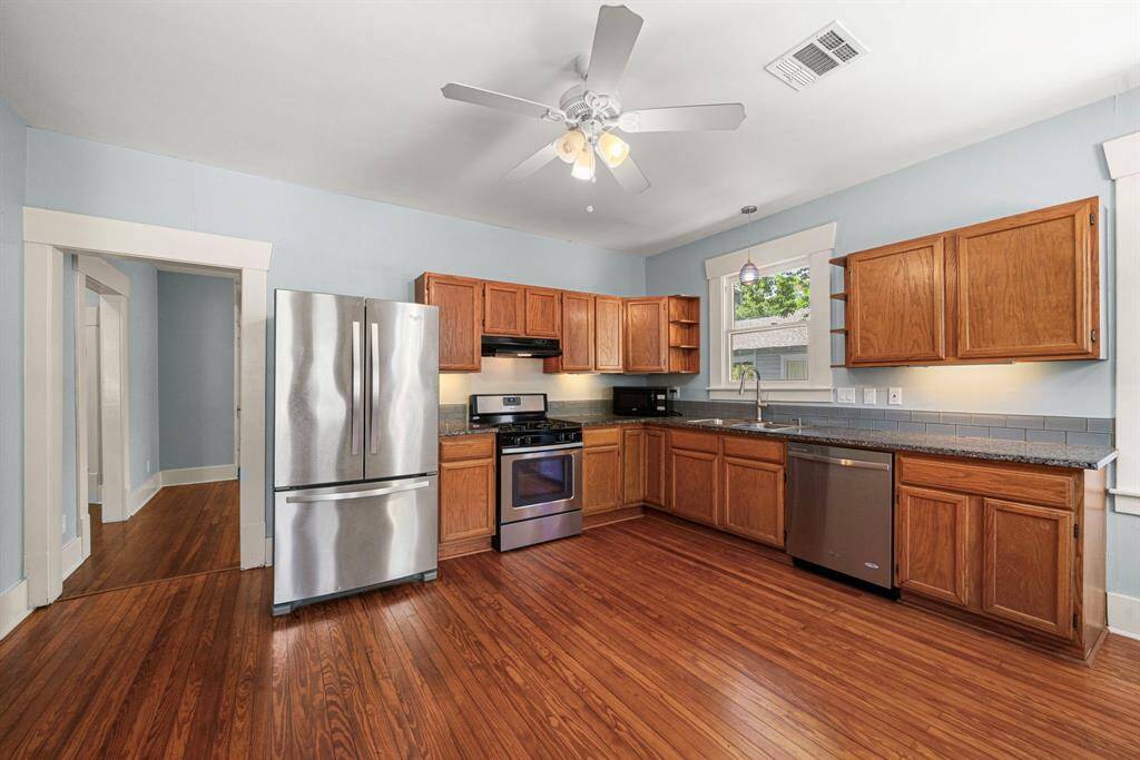 Beyond the dining room, the kitchen is located towards the rear of home. Large 17x15 room.