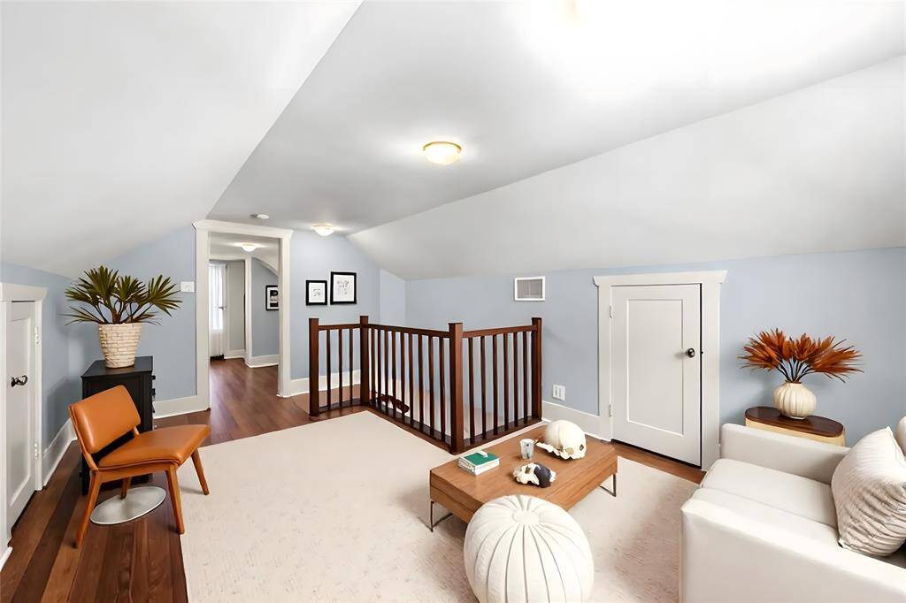 Upstairs landing that can be used as a study or flex space. Virtually staged